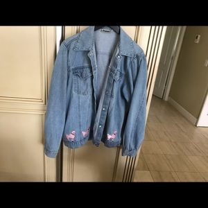 Denim jacket with pink poodles on bottom
